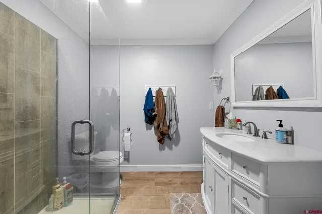a bathroom with a shower and a tub