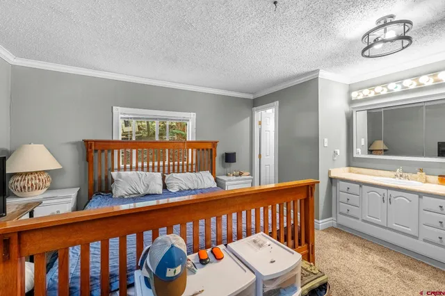 a bathroom with a sink vanity and a mirror