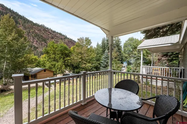 a front view of a house with swimming pool