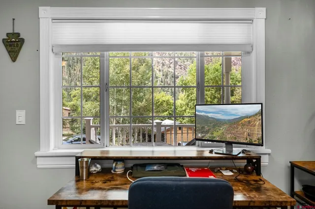 a room with furniture and window