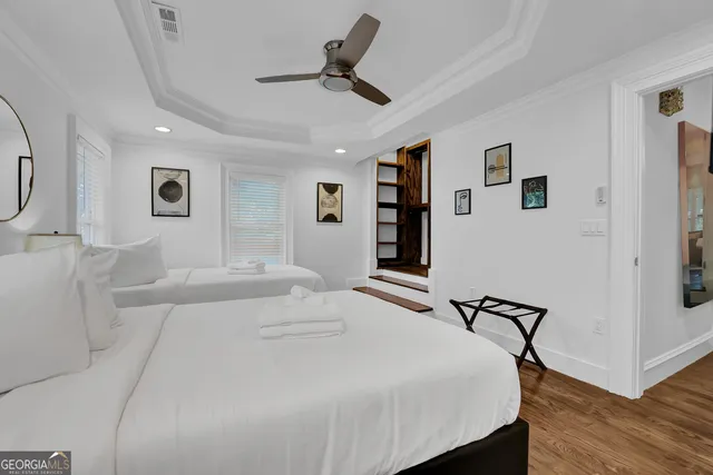 a living room with furniture fireplace and a table