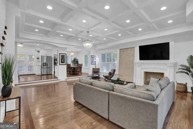 a kitchen with granite countertop cabinets stainless steel appliances and wooden cabinets