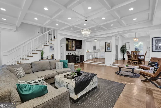 a kitchen with stainless steel appliances granite countertop a refrigerator and cabinets