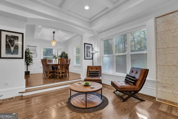 a bedroom with a bed and a chair