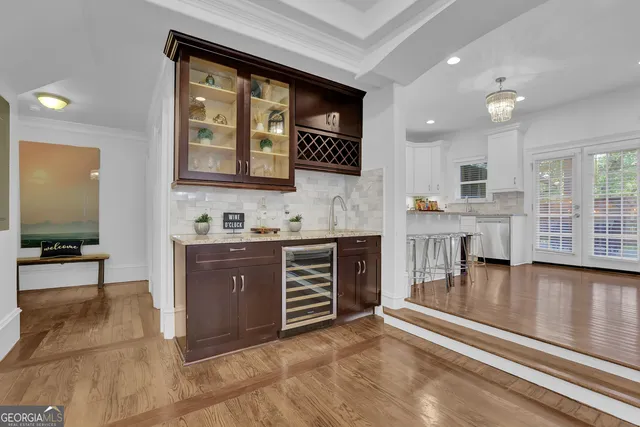 a large white bed in a white room