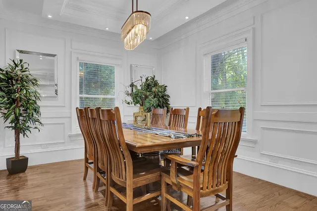 a bathroom with a sink mirror vanity and toilet