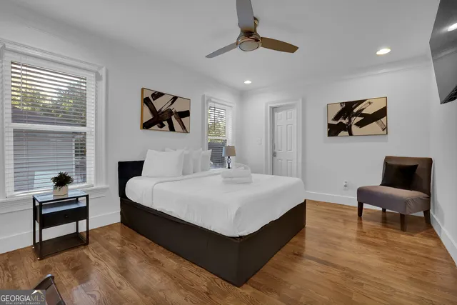 a bathroom with a sink a toilet and shower curtain