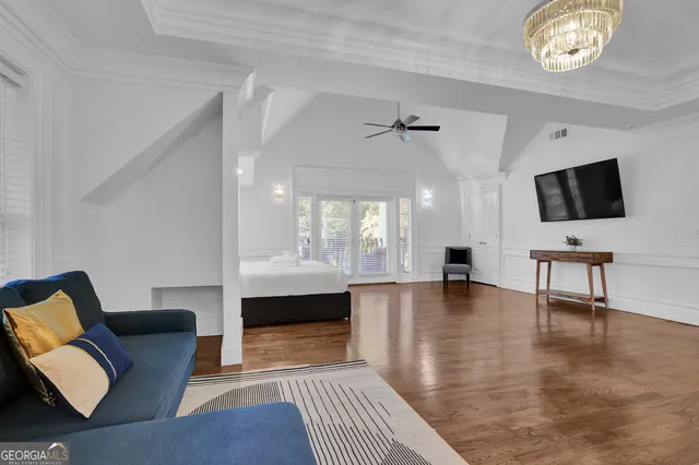 a bathroom with bathtub and window