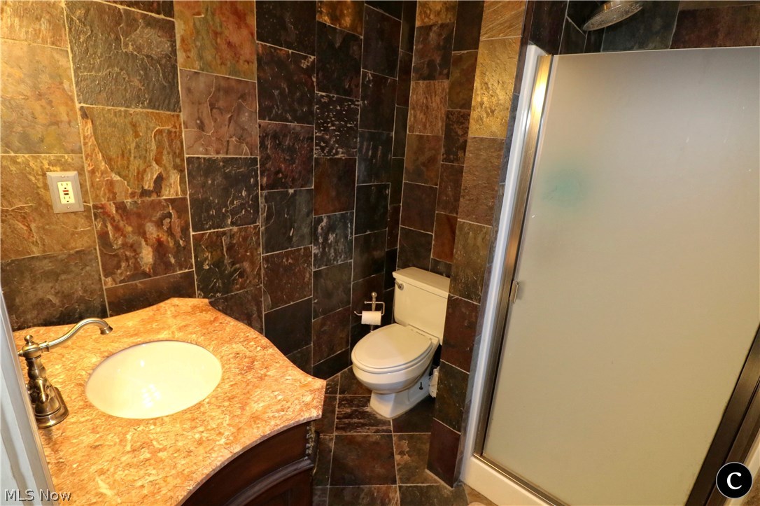 848 Lander Road Cleveland, OH 44143 - Photo 13 of 30 MASTER SUITE BATHROOM DONE ALSO IN SLATE FROM TOP TO BOTTOM. BEAUTIFUL