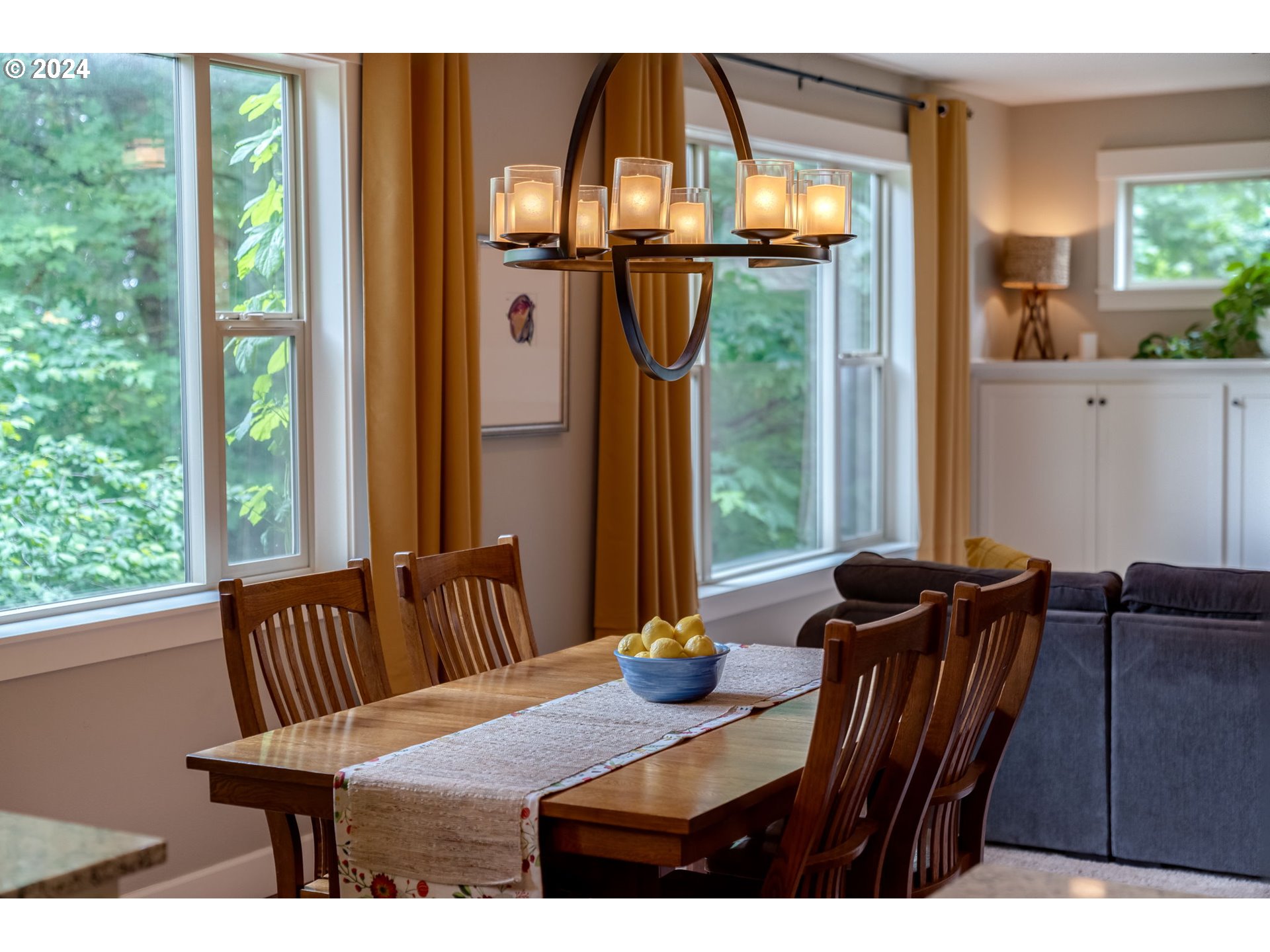 15057 Southeast Glenbrook Road Happy Valley, OR 97015 - Photo 11 of 43 a view of a dining room with furniture and window