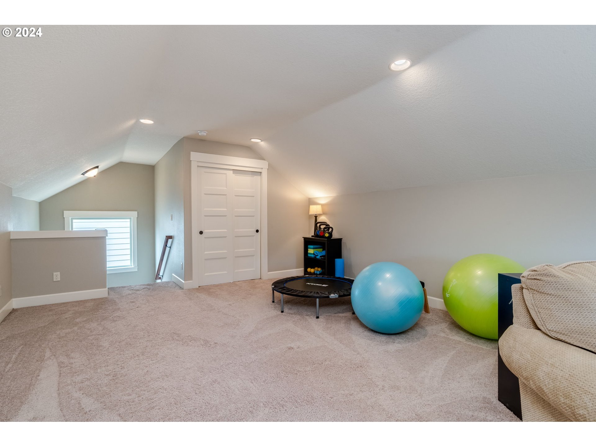15057 Southeast Glenbrook Road Happy Valley, OR 97015 - Photo 29 of 43 a living room with furniture and white walls