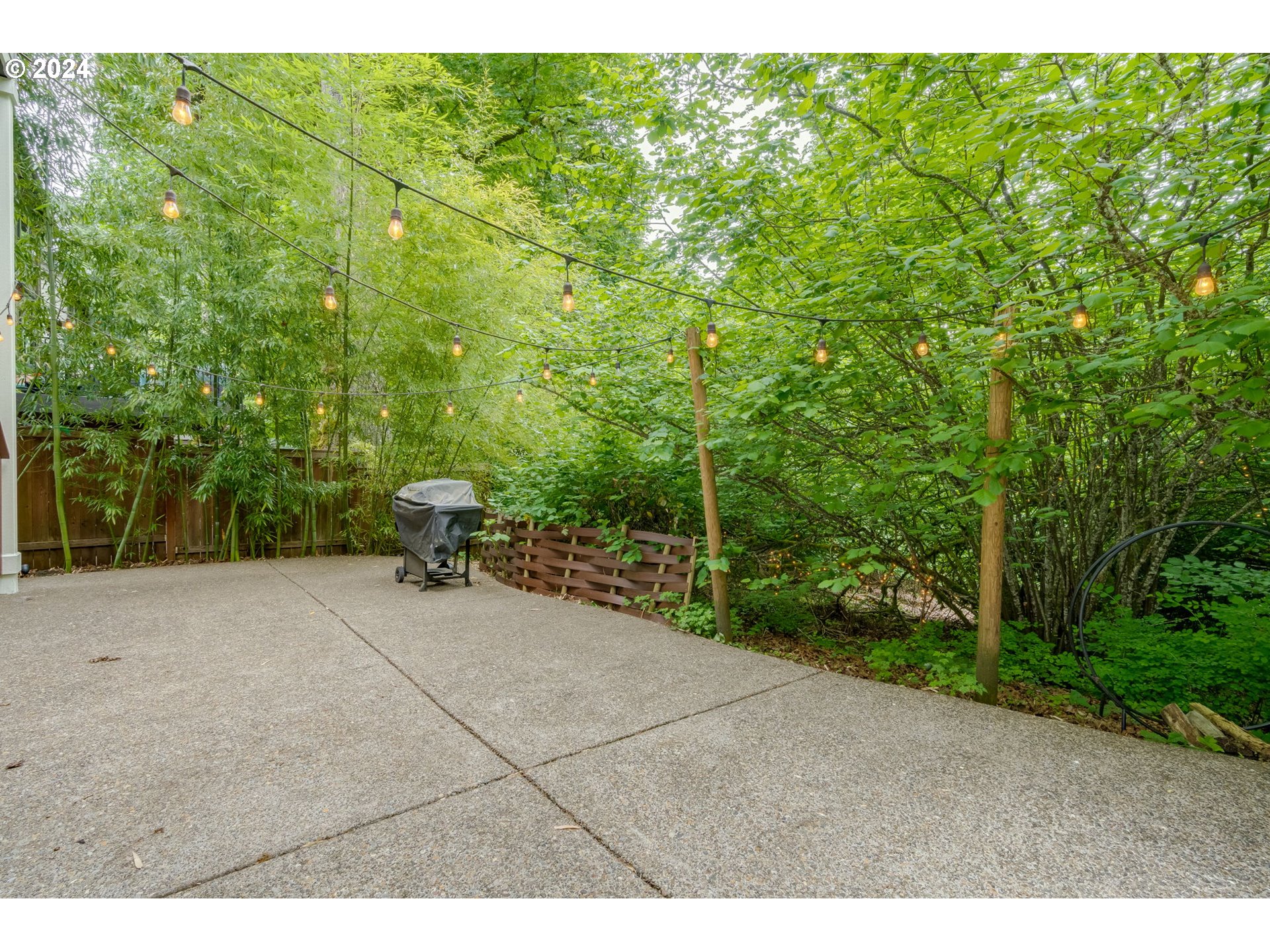 15057 Southeast Glenbrook Road Happy Valley, OR 97015 - Photo 33 of 43 a view of a yard with plants and trees
