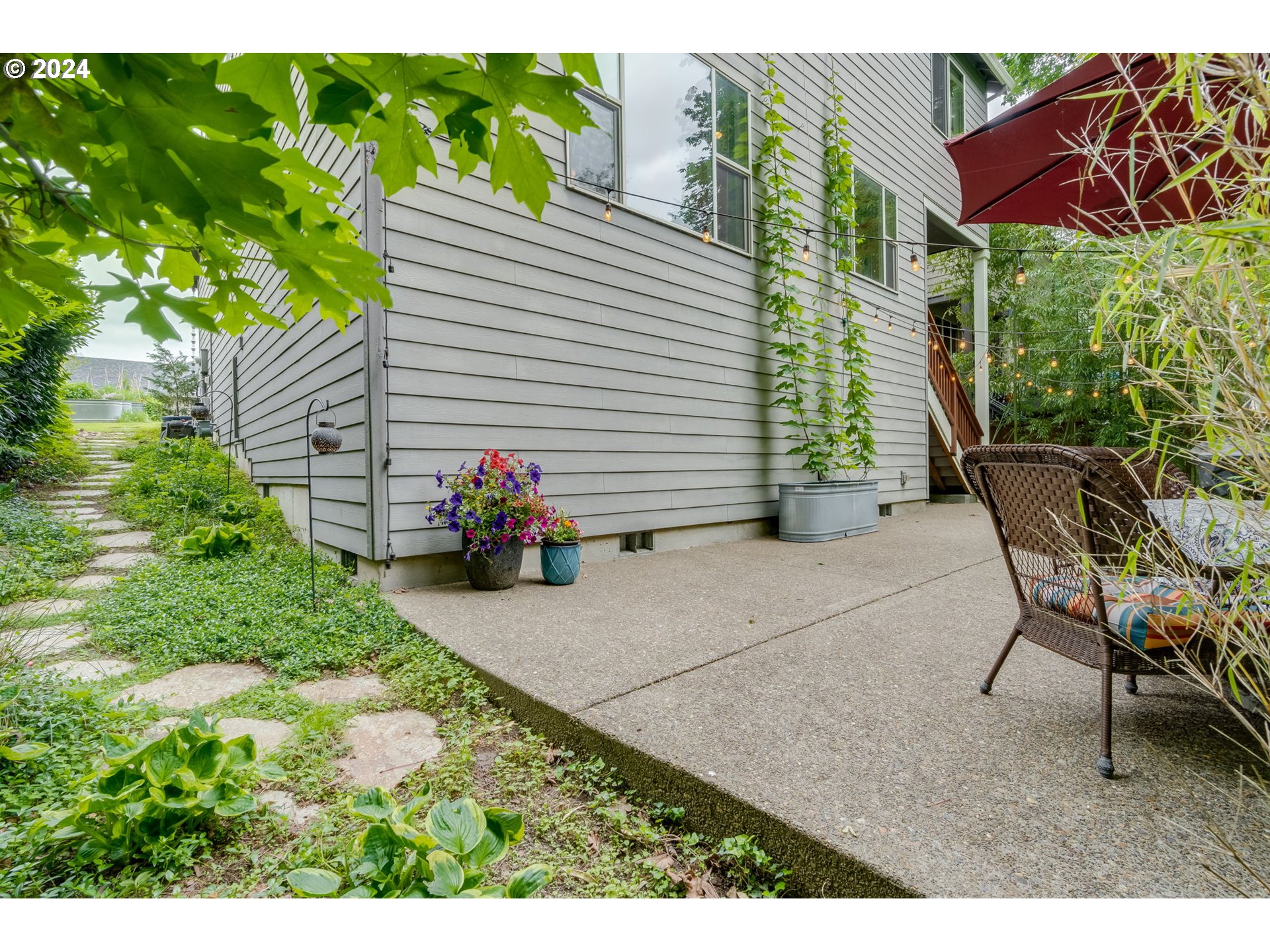 15057 Southeast Glenbrook Road Happy Valley, OR 97015 - Photo 37 of 43 a view of an outdoor space with a patio