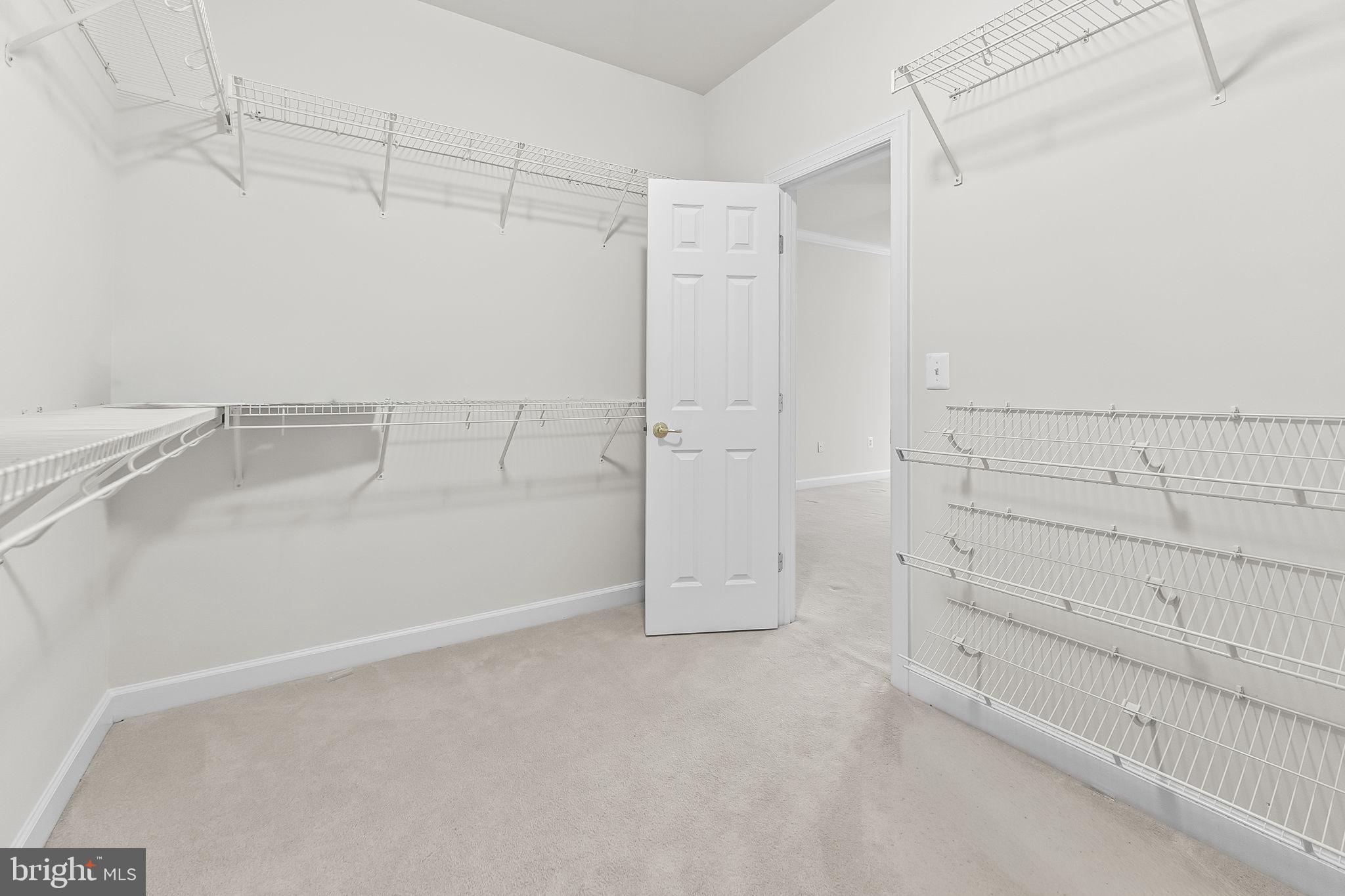 9290 Gunston Road Welcome, MD 20693 - Photo 27 of 64 Texas Sized Owners Suite Walk-in Closet