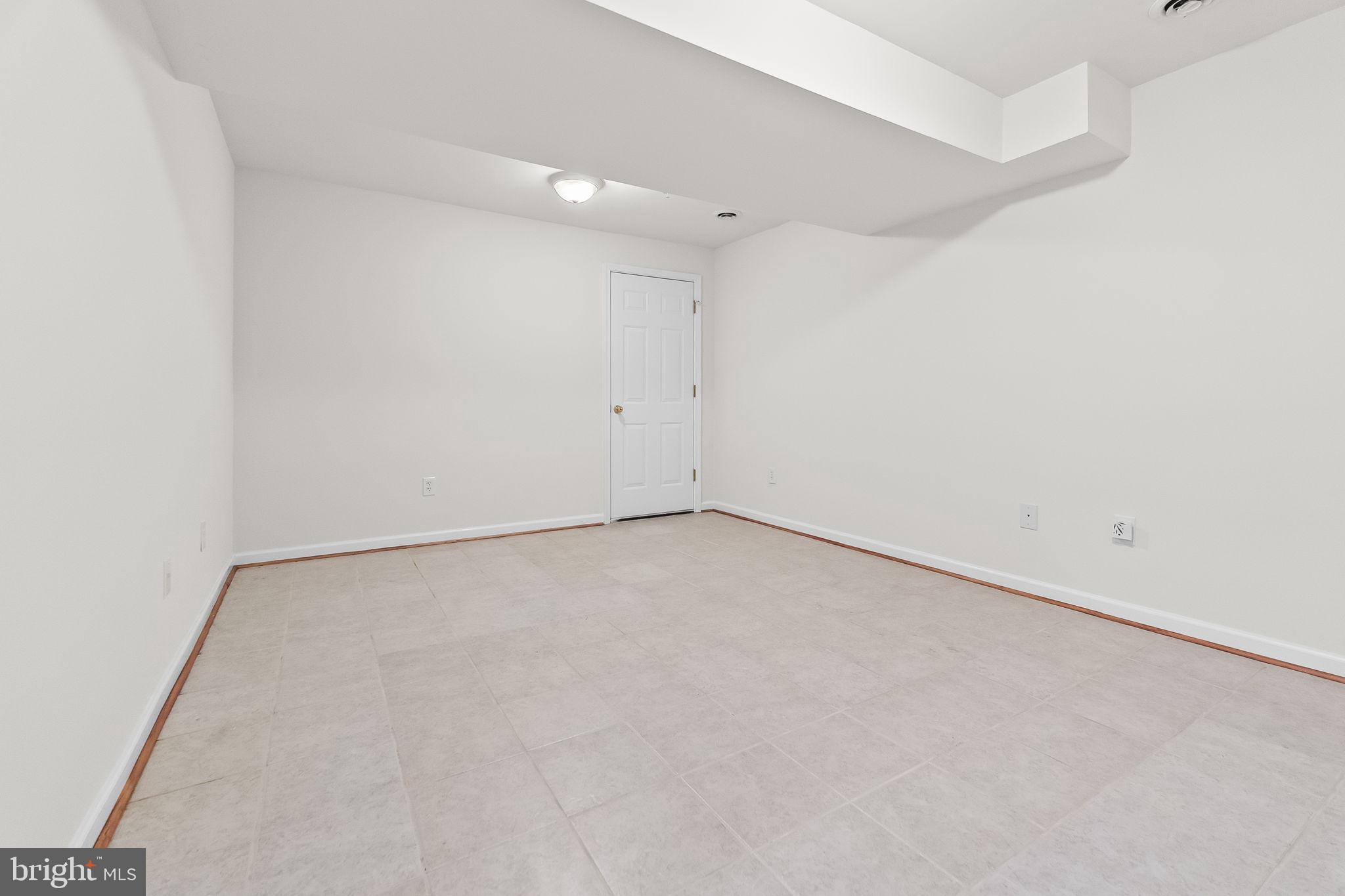 9290 Gunston Road Welcome, MD 20693 - Photo 47 of 64 Finished room for potential office or 4th bedroom