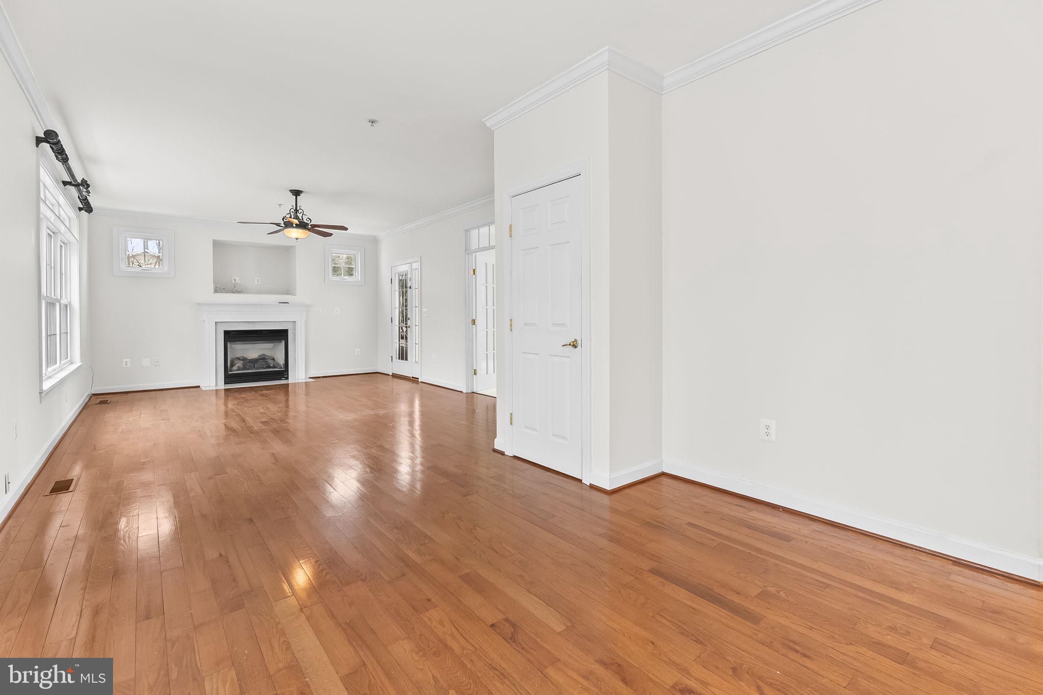 9290 Gunston Road Welcome, MD 20693 - Photo 6 of 64 Spacious Family Room with Hardwood Floors
