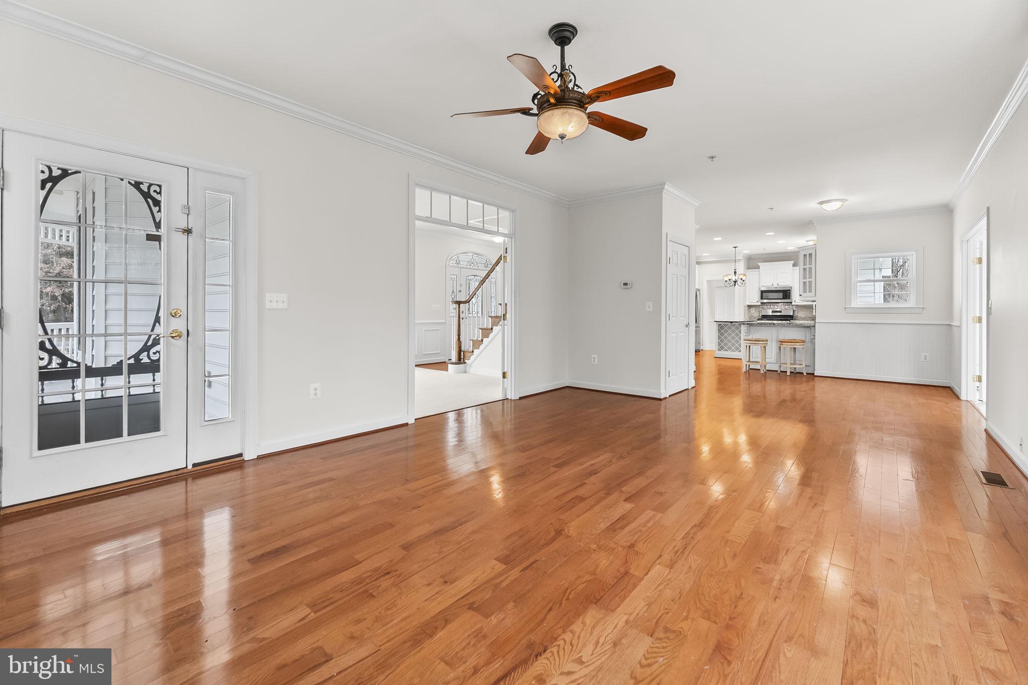 9290 Gunston Road Welcome, MD 20693 - Photo 7 of 64 Spacious Family Room with Hardwood Floors