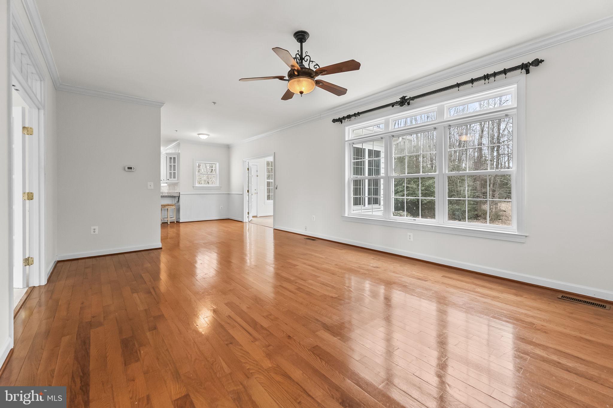 9290 Gunston Road Welcome, MD 20693 - Photo 8 of 64 Spacious Family Room with Hardwood Floors
