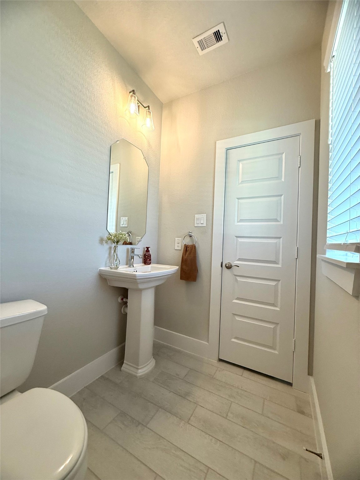 408 Hampton Edge Lane Waller, TX 77484 - Photo 11 of 16 a bathroom with a sink toilet and shower