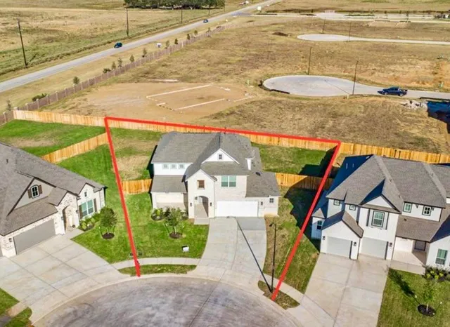 a view of swimming pool with a patio