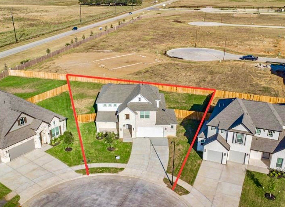 408 Hampton Edge Lane Waller, TX 77484 - Photo 3 of 16 a view of swimming pool with a patio