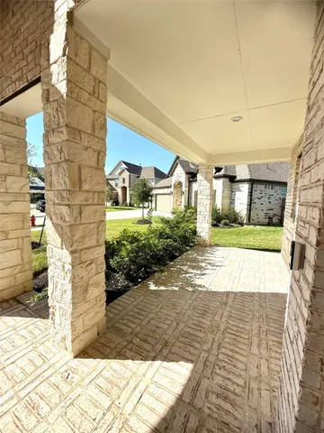 a view of a pathway both side of house