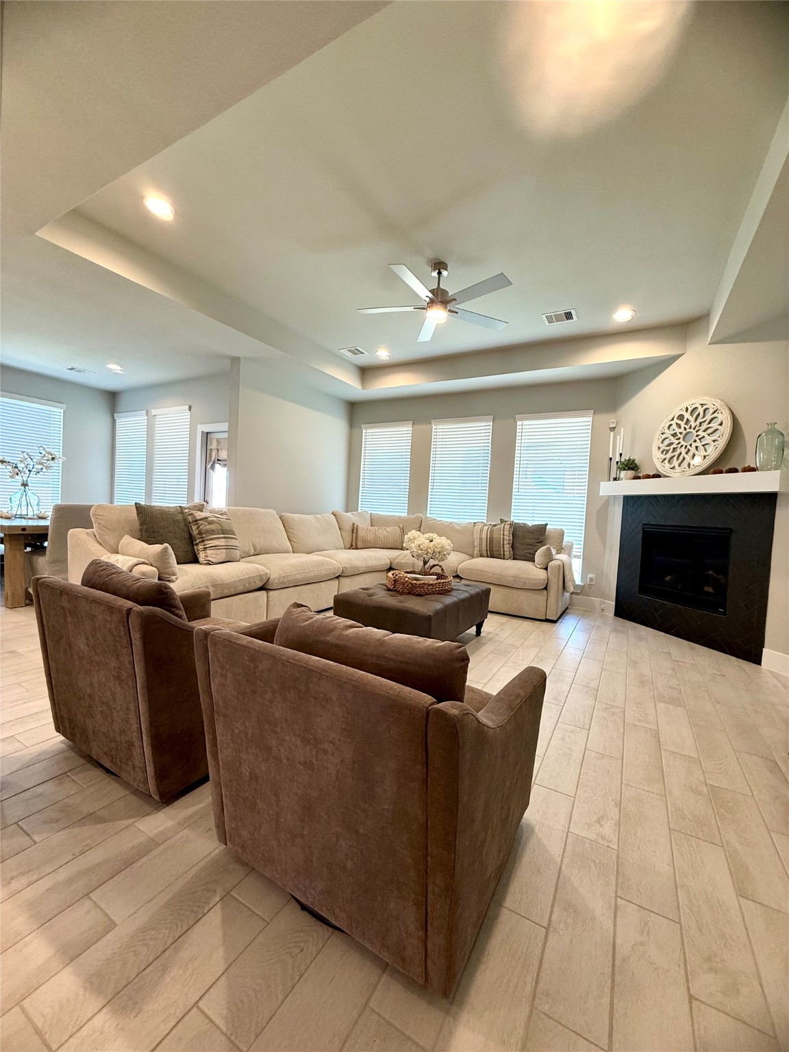 408 Hampton Edge Lane Waller, TX 77484 - Photo 6 of 16 a living room with furniture a large window and a fireplace