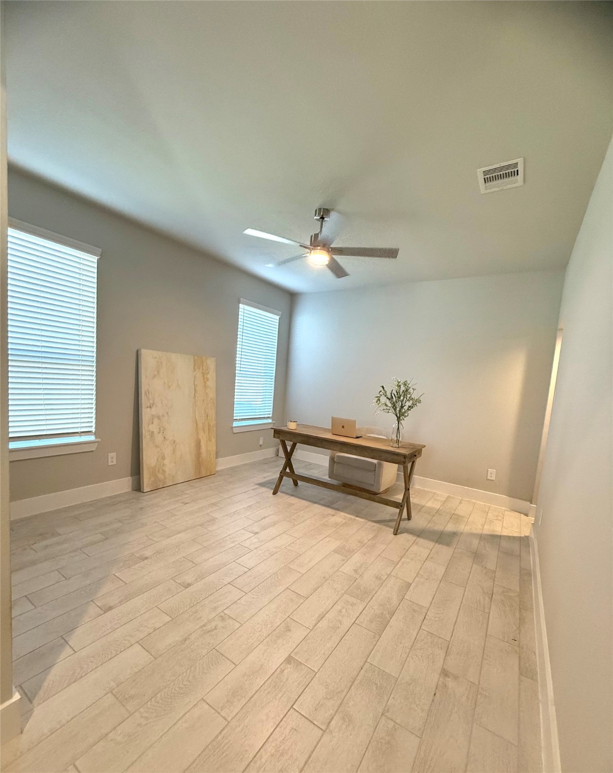 408 Hampton Edge Lane Waller, TX 77484 - Photo 10 of 16 a view of a room with furniture and a window