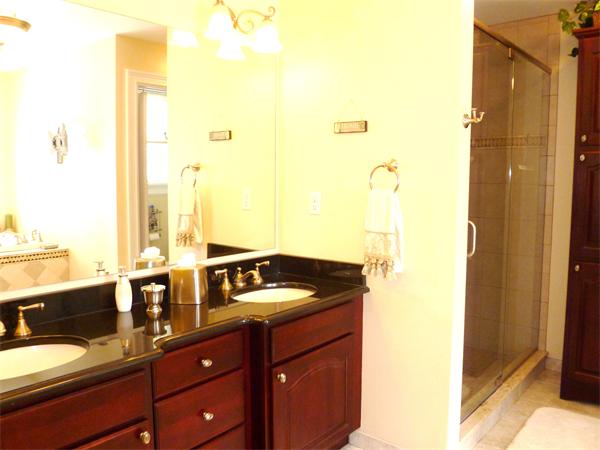 59 Gilman Road Waltham, MA 02452 - Photo 15 of 30 a kitchen with a sink and a refrigerator