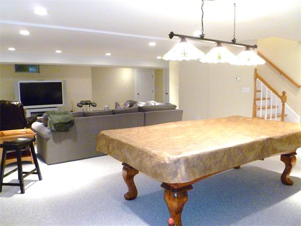 59 Gilman Road Waltham, MA 02452 - Photo 18 of 30 a dining room with a table and chairs