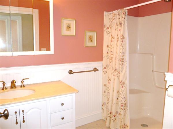59 Gilman Road Waltham, MA 02452 - Photo 27 of 30 a bathroom with a sink and a mirror