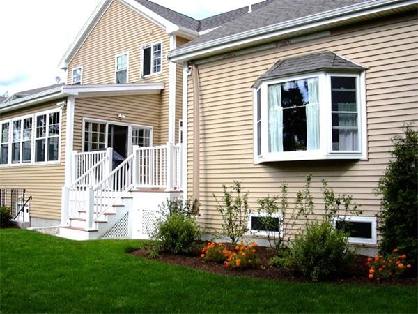 59 Gilman Road Waltham, MA 02452 - Photo 28 of 30 a front view of a house with a yard