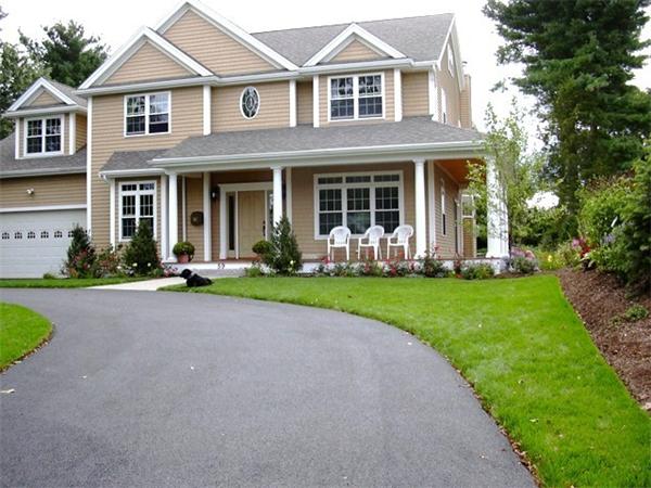 59 Gilman Road Waltham, MA 02452 - Photo 29 of 30 a front view of a house with a yard