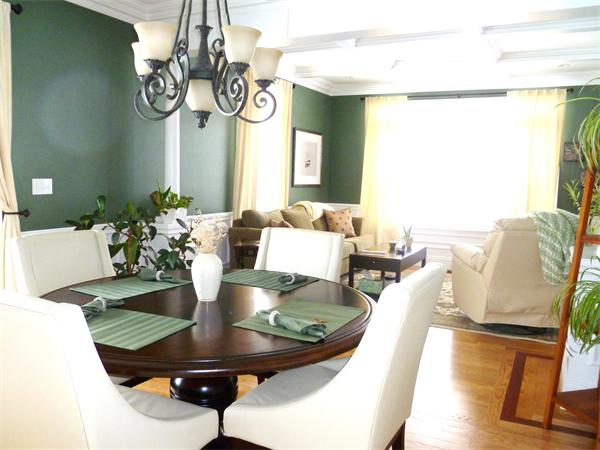 59 Gilman Road Waltham, MA 02452 - Photo 4 of 30 a view of a dining room with furniture a chandelier and wooden floor