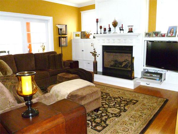 59 Gilman Road Waltham, MA 02452 - Photo 7 of 30 a living room with furniture and a fireplace