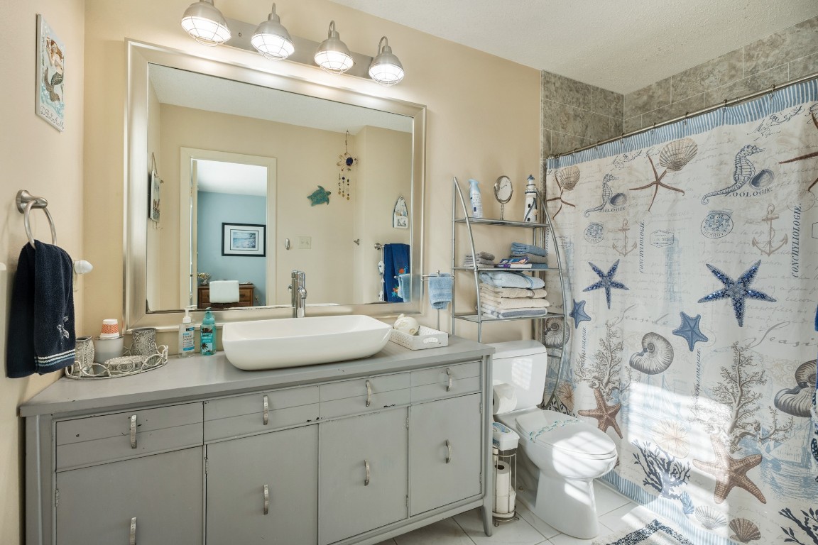 16507 Captain Kidd Road Jamaica Beach, TX 77554 - Photo 13 of 37 Primary bathroom - privacy and great space.