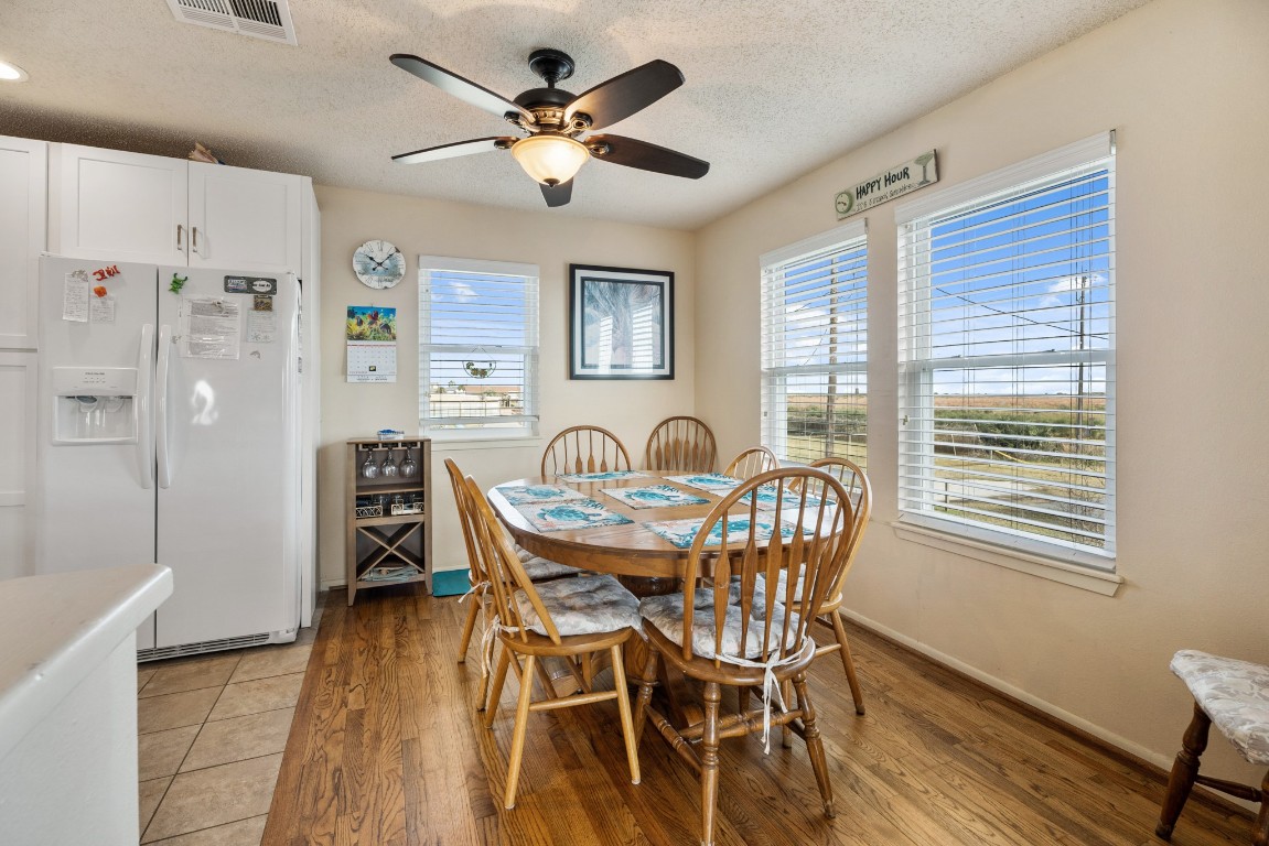 16507 Captain Kidd Road Jamaica Beach, TX 77554 - Photo 7 of 37 Dining area features view to the nature and Galveston bay area.