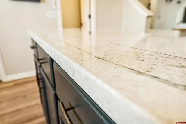 a view of balcony with wooden floor