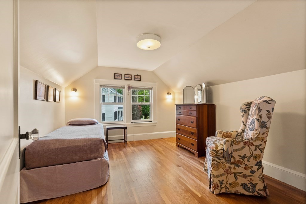 21 Eliot Road Lexington, MA 02421 - Photo 24 of 30 a living room with furniture and wooden floor