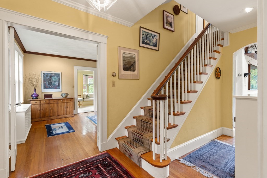 21 Eliot Road Lexington, MA 02421 - Photo 4 of 30 a view of a livingroom with wooden floor and furniture