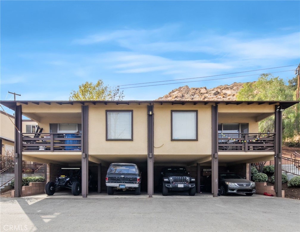 3060 Panorama Road Riverside, CA 92506 - Photo 12 of 38 a view of a car park in front of house