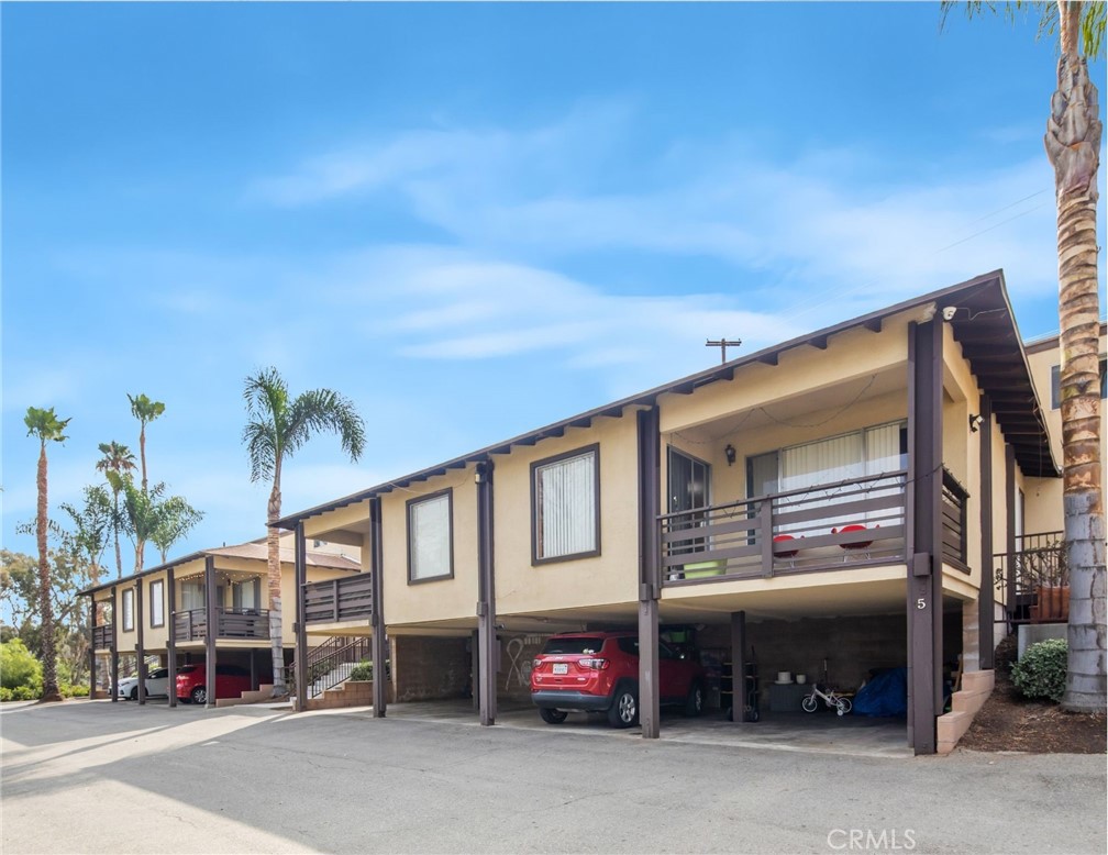 3060 Panorama Road Riverside, CA 92506 - Photo 14 of 38 a view of a car park in front of house