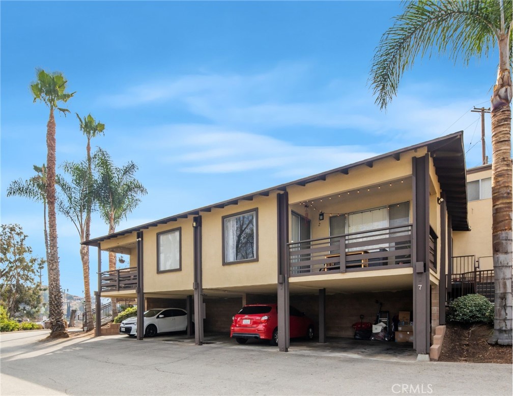 3060 Panorama Road Riverside, CA 92506 - Photo 17 of 38 a view of a car park in front of house