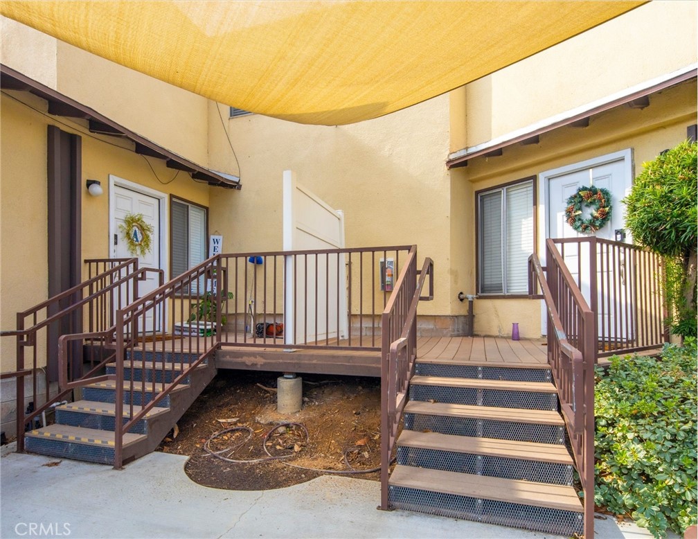 3060 Panorama Road Riverside, CA 92506 - Photo 19 of 38 a view of entryway with wooden floor and front door