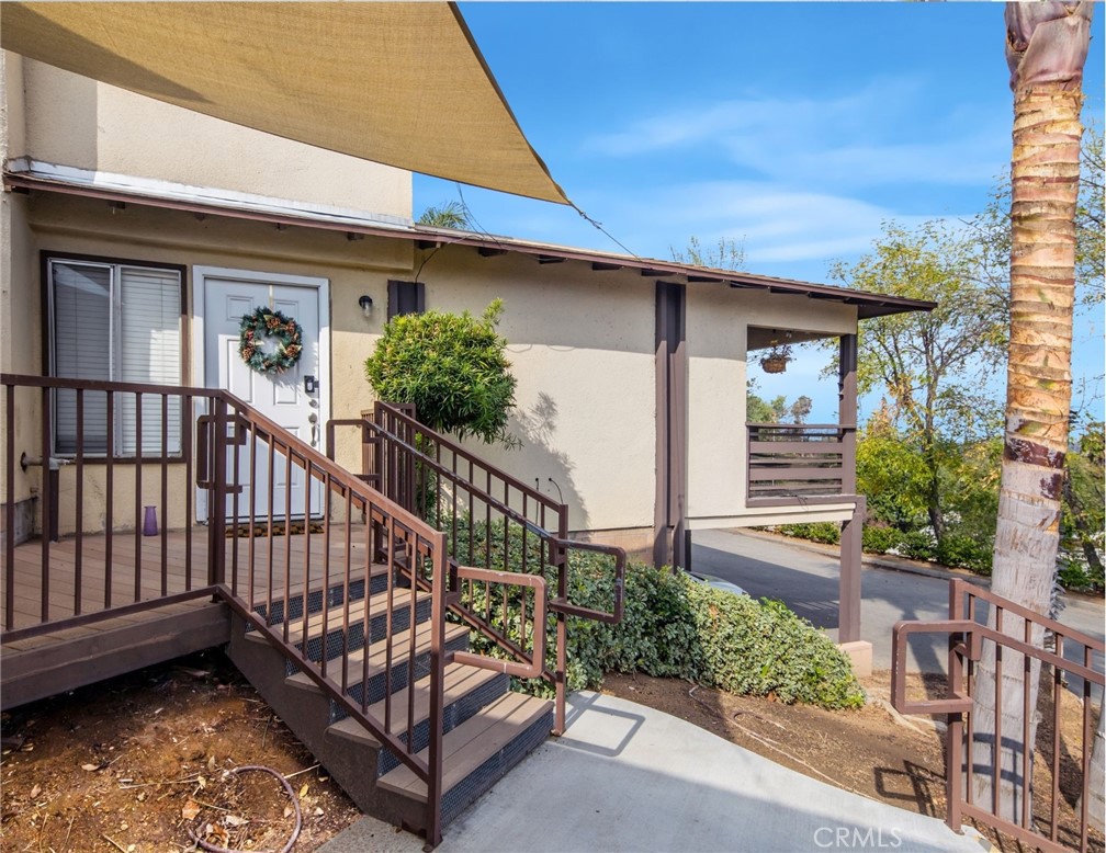 3060 Panorama Road Riverside, CA 92506 - Photo 20 of 38 a view of a house with wooden floor and a small yard