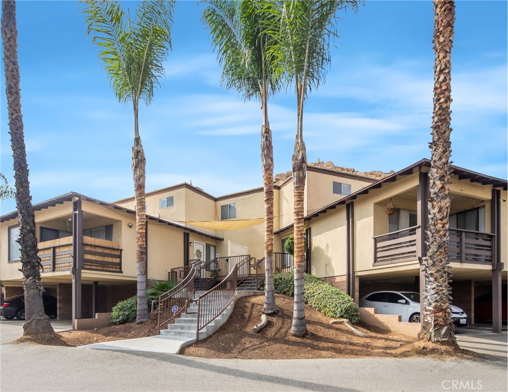 3060 Panorama Road Riverside, CA 92506 - Photo 2 of 38 a front view of a house with garden and parking