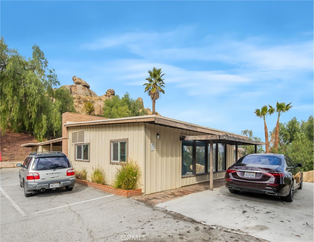 3060 Panorama Road Riverside, CA 92506 - Photo 6 of 38 a view of a car parked in front of a house