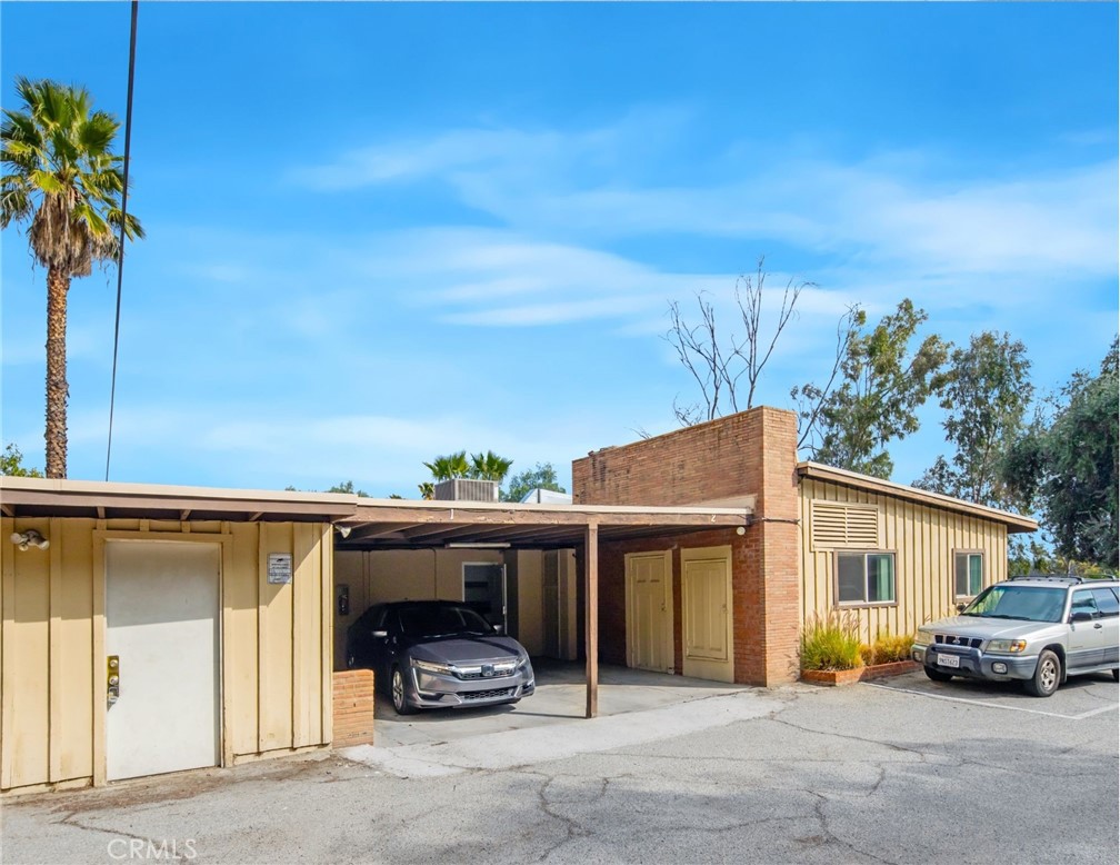 3060 Panorama Road Riverside, CA 92506 - Photo 8 of 38 a view of a car parked in front of a house
