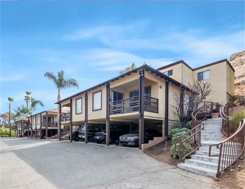 3060 Panorama Road Riverside, CA 92506 - Photo 10 of 38 a view of a house with a patio and a yard