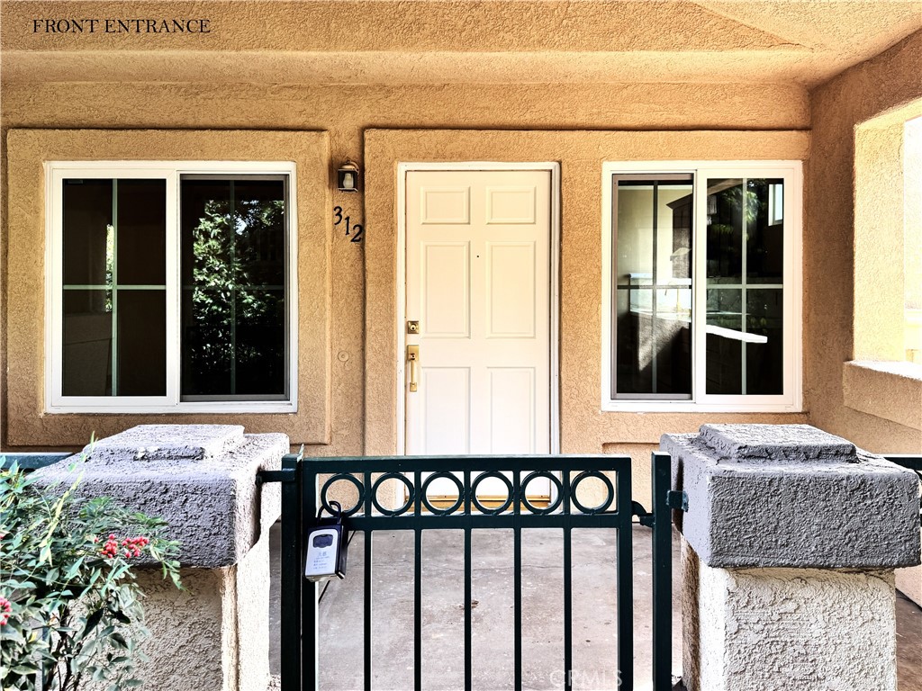 312 Torito Lane Diamond Bar, CA 91765 - Photo 1 of 20 a front view of a house with a porch